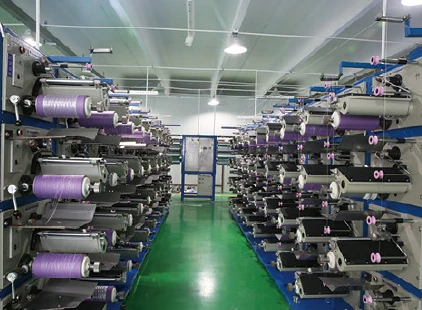 Workshop of yarn winding machines for optical cable water-blocking materials Workshop of yarn winding machines for optical cable water-blocking materials